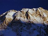 
Annapurna Main (8091m), Central (8051m) and East (8026m) summits dominate the view at sunrise from Annapurna Sanctuary Base Camp.
